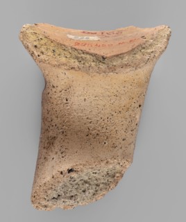 Fragment of a vice from a Sinopean transport amphora with a rectangular four-line stamp: