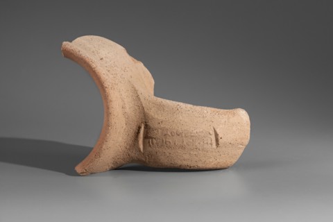 Fragment of the spout and stamped vise of a Sinopean amphora. The spout is a low, semicircular