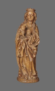 Figure of St. Barbara, sculptor unknown. Medieval wall sculpture, hollowed out from behind the head