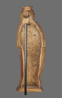 Figure of St. Barbara, St. Barbara d. 306. Medieval wall sculpture, hollowed out from behind the