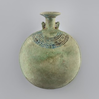 New Year's Canteen, A flat faience canteen with a belly resembling two flattened spherical segments