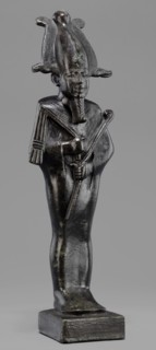 Figurine of the god Osiris, Osiris mythology; statuette of a standing Osiris wrapped in a long,