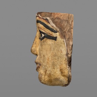 Woman's sarcophagus mask. Mask of wood covered with a layer of canvas with paint applied. The face