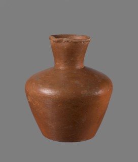 Jug, ceramics, Egyptian pottery. Medium-sized clay jug with a biconical body, widest at about half