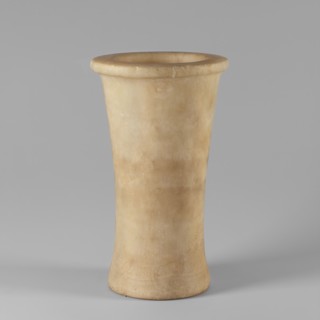 Bastet, stone vessel. The vessel walls taper gently to 1/3 of the height of the entire artifact,