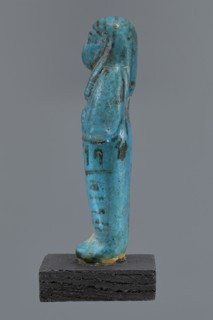Ushabti Cha-em-uase, Cha-em-uase private name. A mummy-shaped shabti figurine made of faience,