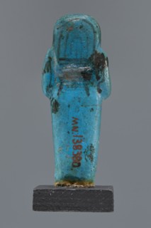 Ushabti Cha-em-uase, Cha-em-uase private name. A mummy-shaped figurine shabti made of faience,