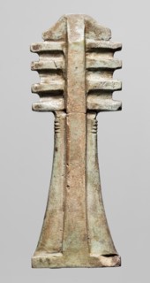 Amulet — djed pillar. Amulet in the shape of the djed hieroglyph with a pillar at the back; at the