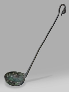 Ladle with a handle in the form of a goose's head. Ladle with a shallow bowl ending in a wide, flat
