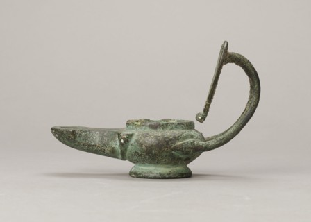 Oil lamp, maker, 1st century; Pozzuoli possibly; oil lamp; weight 0.524 kg., An aged metal lamp