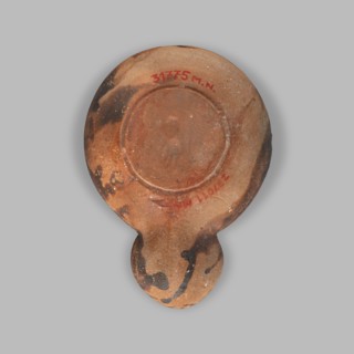 Lamp decorated with a depiction of a dog; unknown eastern workshop; single-burner oil lamp; dogs