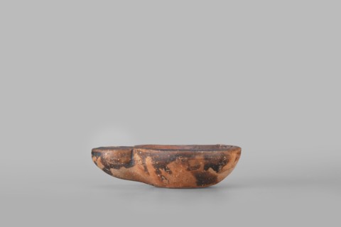 Lamp decorated with a depiction of a dog, unknown eastern workshop; single-burner oil lamp, 1st