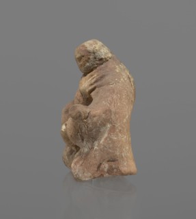 Terracotta figurine of Silenus, Silenus mythology, terracotta. Figurine of an obese Silenus sitting