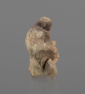 Terracotta figurine of Silenus, Silenus mythology, terracotta. Figurine of an obese Silenus sitting