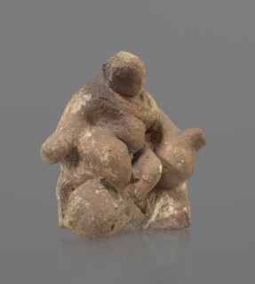 Terracotta figurine of Silenus, Silenus mythology; terracotta. Figurine of an obese Silenus sitting