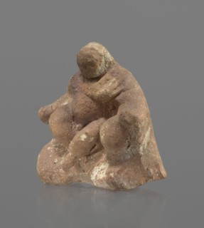 Terracotta figurine of Silenus, Silenus mythology, terracotta. Figurine of an obese Silenus sitting