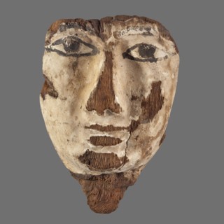 Sarcophagus mask with a small neck fragment, painted cream. Eyes highlighted with black paint.