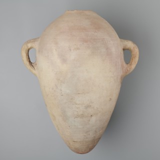 Large amphora with an ovoid shape and a rounded foot. Two small vertical vices placed on the body