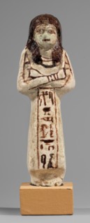 Ushabti of Mrs. As, hieroglyphs, As ca. 1295–1069 BC. Figurine in living costume, loincloth