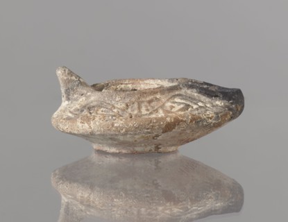 Oil lamp, Islamic art; Arabic culture; functional ceramic oil lamp. Oval lamp with short burner