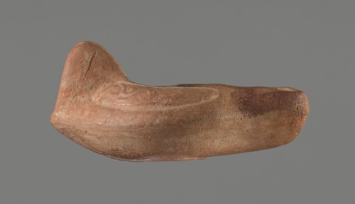 Oil lamp, Horse iconography. Lamp pressed from a mold. Light red clay with brownish-red engobe.