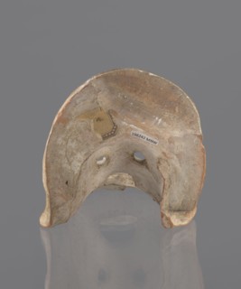 Tragic mask, terracotta, 4th/3rd century BC, Southern Italy. Tragic mask depicting a male face,