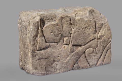 Relief depicting Ramesses II with a ritual vessel; uraeus on wig; hes vase and possible incense