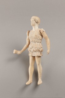 Doll with movable limbs, terracotta, made of terracotta. The doll depicts a woman in a short,