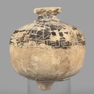 Vessel in the form of a pomegranate, 6th century BC, eastern Greece; terracotta vessel, height 7.5
