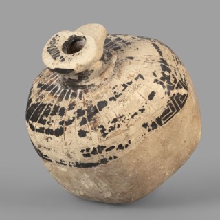 Vessel in the form of a pomegranate, 6th century BC, eastern Greece; terracotta vessel, height 7.5