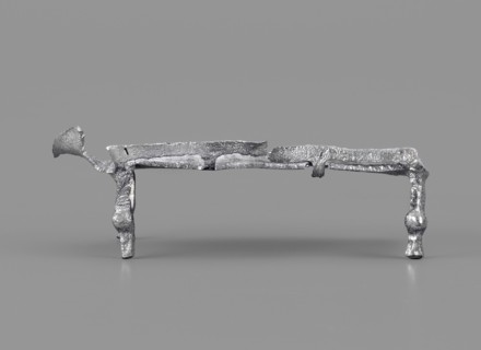 Miniature bed, votive offering or model of furniture; rests on four legs formed from square bars
