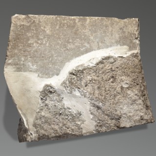 Fragment of an orthostat with relief decoration, unknown Neo-Assyrian workshop. Fragment of a stone