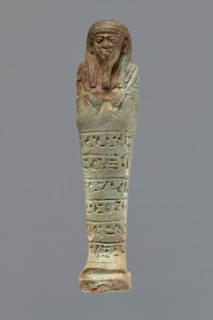 Ushabti, Mummy-shaped figurine, funerary shabti, 664–332 BC Late Period, Egypt. Standing on a base,