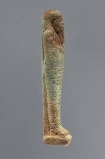 Ushabti, Mummy-shaped figurine, funerary shabti, 664–332 BC Late Period, Egypt. Standing on a base,