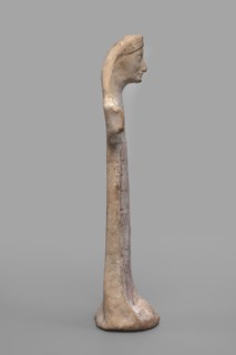 Idol with a full-bodied female head, Standing female figure with a torso flattened on both sides, a