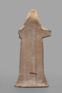 Idol with a full-bodied female head, standing female figure with a torso flattened on both sides