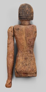 Male statue by Genius, Mieczyslaw 1853–1920. Egyptian sculpture, Old Kingdom, 6th Dynasty, c.