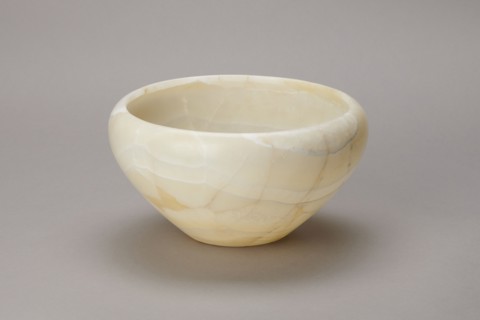 Bowl, Large stone bowl with a small flat bottom, slightly flared side walls bent inwards at the top