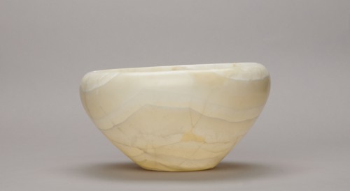 Bowl, stone vessel; large bowl with a small flat bottom, slightly flared side walls at the top bent