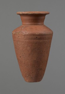 Vessel, Conical-shaped clay vessel, widest at approximately 3/4 of its height with quite wide,