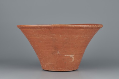 Deep bowl. Deep, cup-shaped bowl with a slightly convex bottom and sides arching upwards; straight,