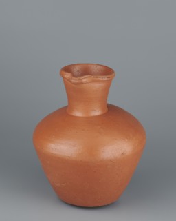 Jug. Medium-sized biconical clay jug with wide, rather sloping shoulders and a wide neck that is