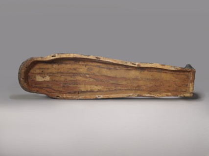 Lid of an anthropoid sarcophagus of a woman. Lid with clearly modeled legs; head sculpturally