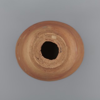 A vessel so-called flower pot for baking bread with a conical shape and a flat bottom. The shape of