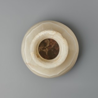 Vessel, globular vessel with a short, wide neck and a large upturned spout, with a flattened
