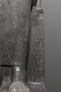 Statue of the goddess Sekhmet, Sekhmet mythology. Woman with a lioness's head seated on a throne,