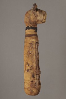 Cat mummy, cat mummy decorated with a meander made of white and brown bandages; materials: fabrics,