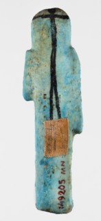 Shabti overseer Amenemone. A shabti figurine depicted in living attire, wearing a knee-length