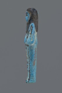 Ushabti Henut-netjeru, Henut-netjeru private name. Mummy-shaped figurine, grave good; shabti. Arms