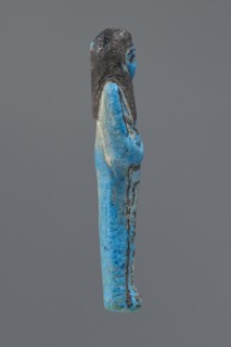 Ushabti Henut-netjeru, Henut-netjeru private name. Mummy-shaped figurine; shabti. Arms crossed on